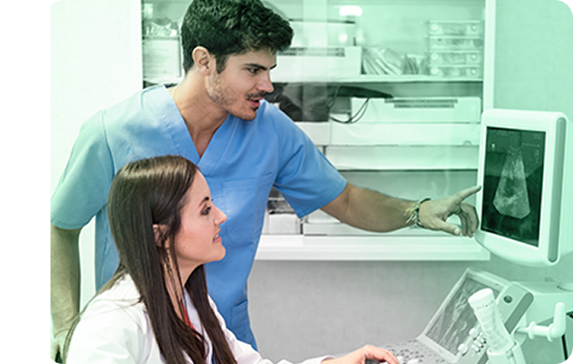 image of two sonographers interpreting an ultrasound
